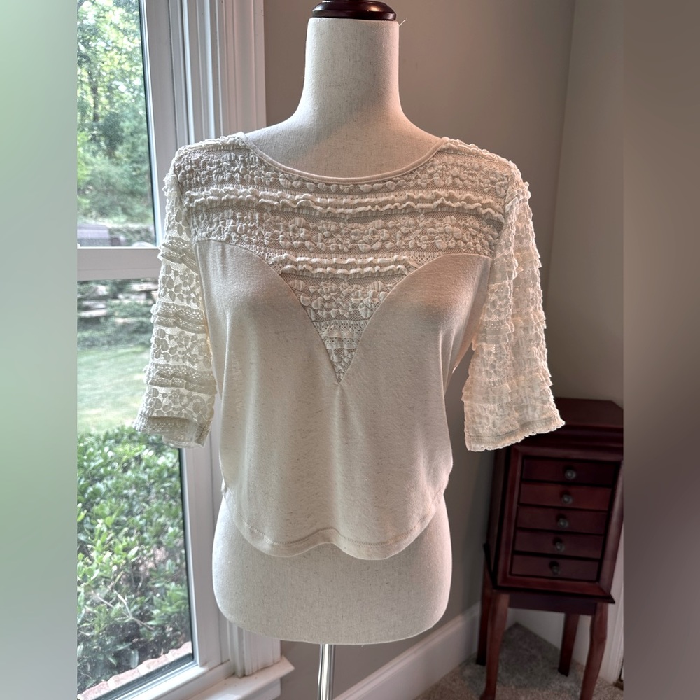 Super cute lacy short sleeved top. Scoop back. Off-white